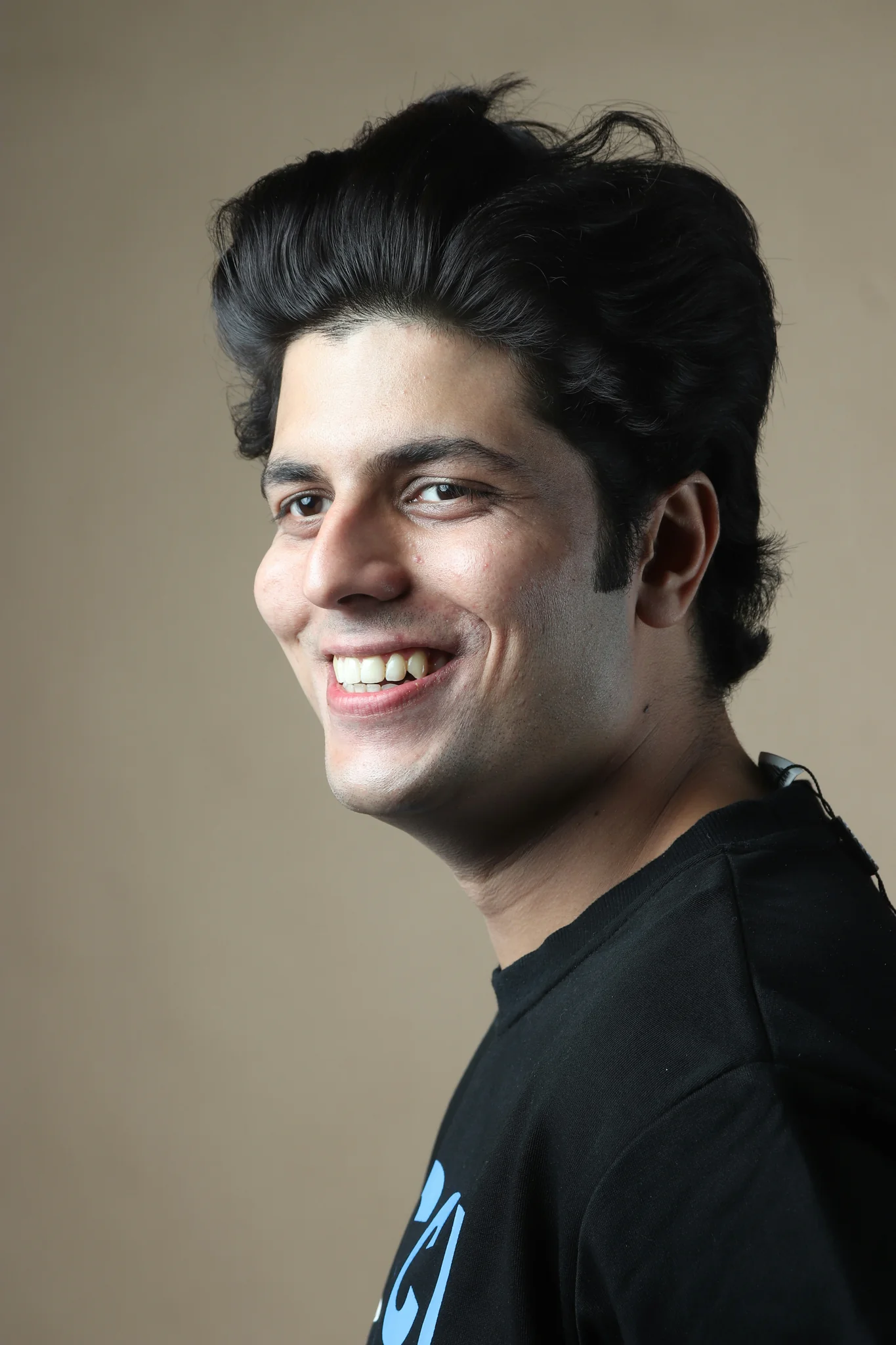 a man with a smile on his face