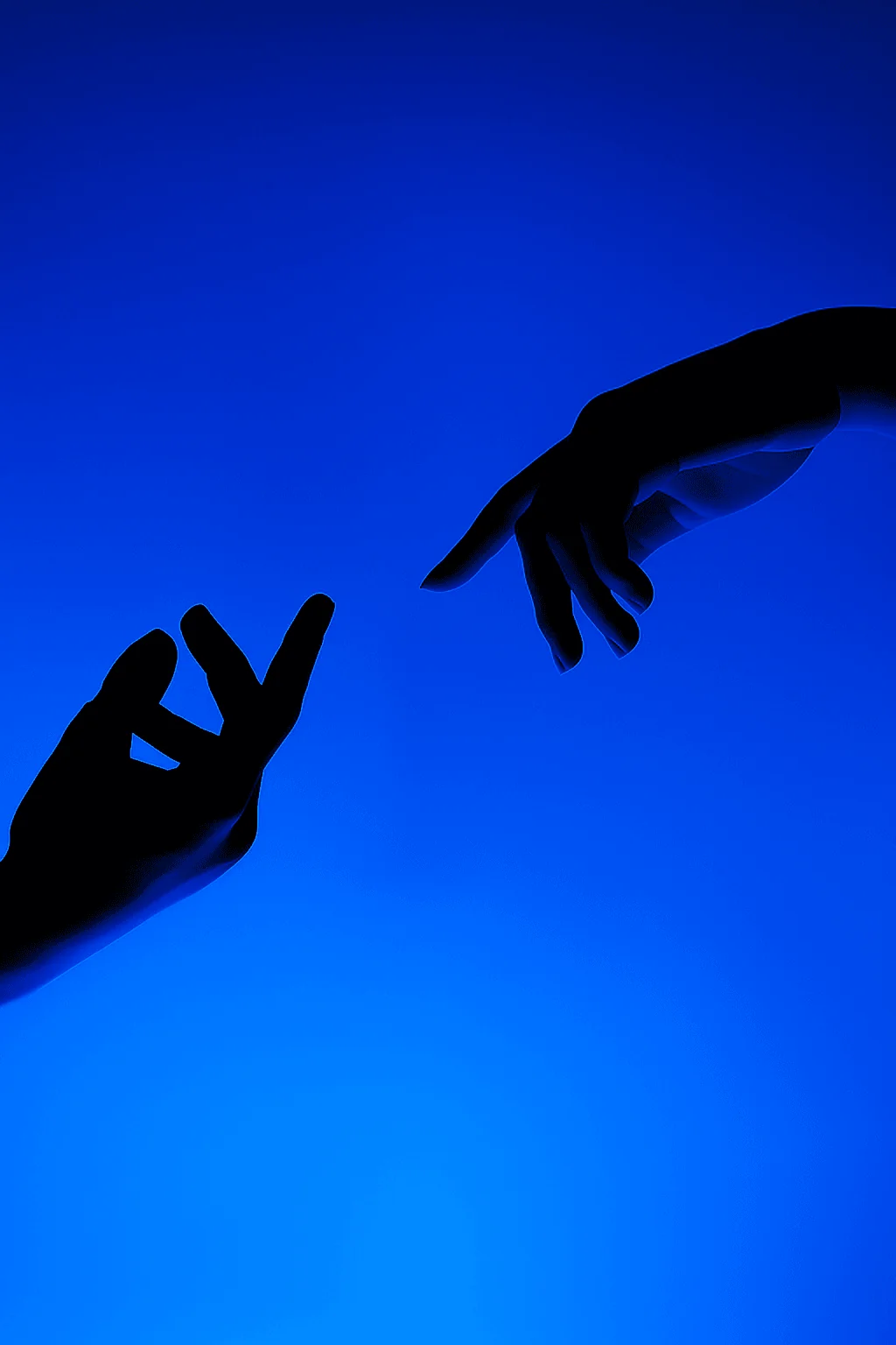 Silhouetted hands reaching toward each other in a blue light.