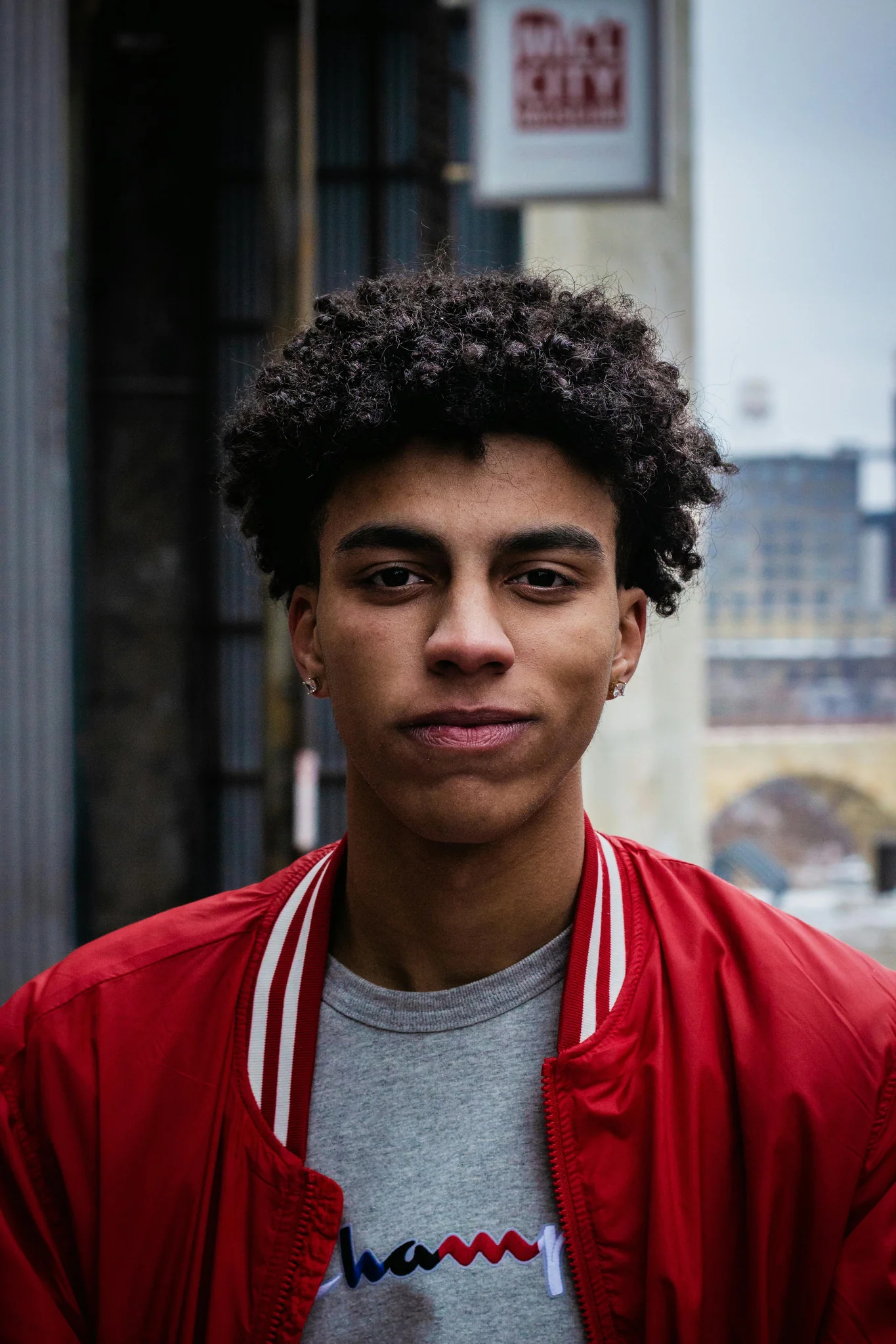 smiling man standing near street